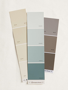 Three Benjamin Moore Display Chips on a painter's dropcloth. Three Benjamin Moore Display Chips on a painter's dropcloth.