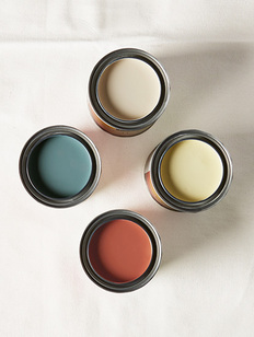 Four pint-sized Paint Color Samples with tops off showcasing a range of paint colors inside. Four pint-sized Paint Color Samples with tops off showcasing a range of paint colors inside.