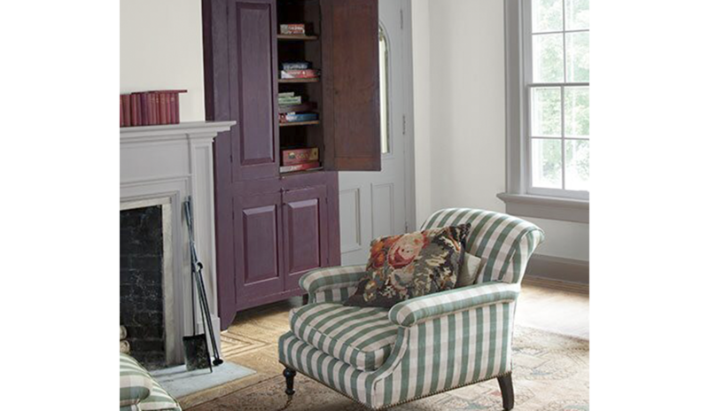 Two distinct gray paint colors yield different undertones in a traditional family room.