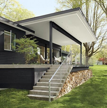 Revestimiento exterior de casa pintado en color Black Beauty 2128-10