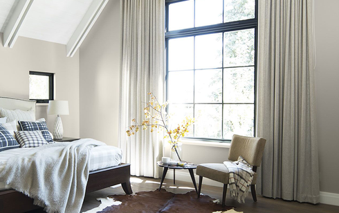 Neutral bedroom painted in Wish AF-680 with white cathedral ceiling in Baby's Breath OC-62.