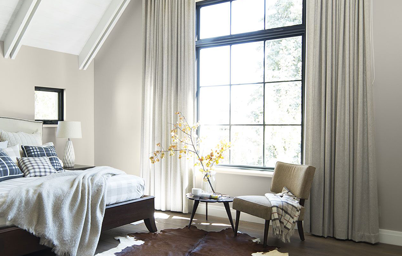 Neutral bedroom painted in Wish AF-680 with white cathedral ceiling in Baby's Breath OC-62.